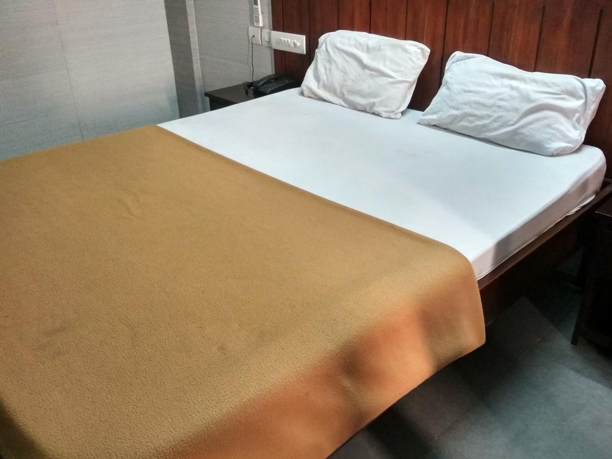 International Tourist Home Кожикод Екстериор снимка