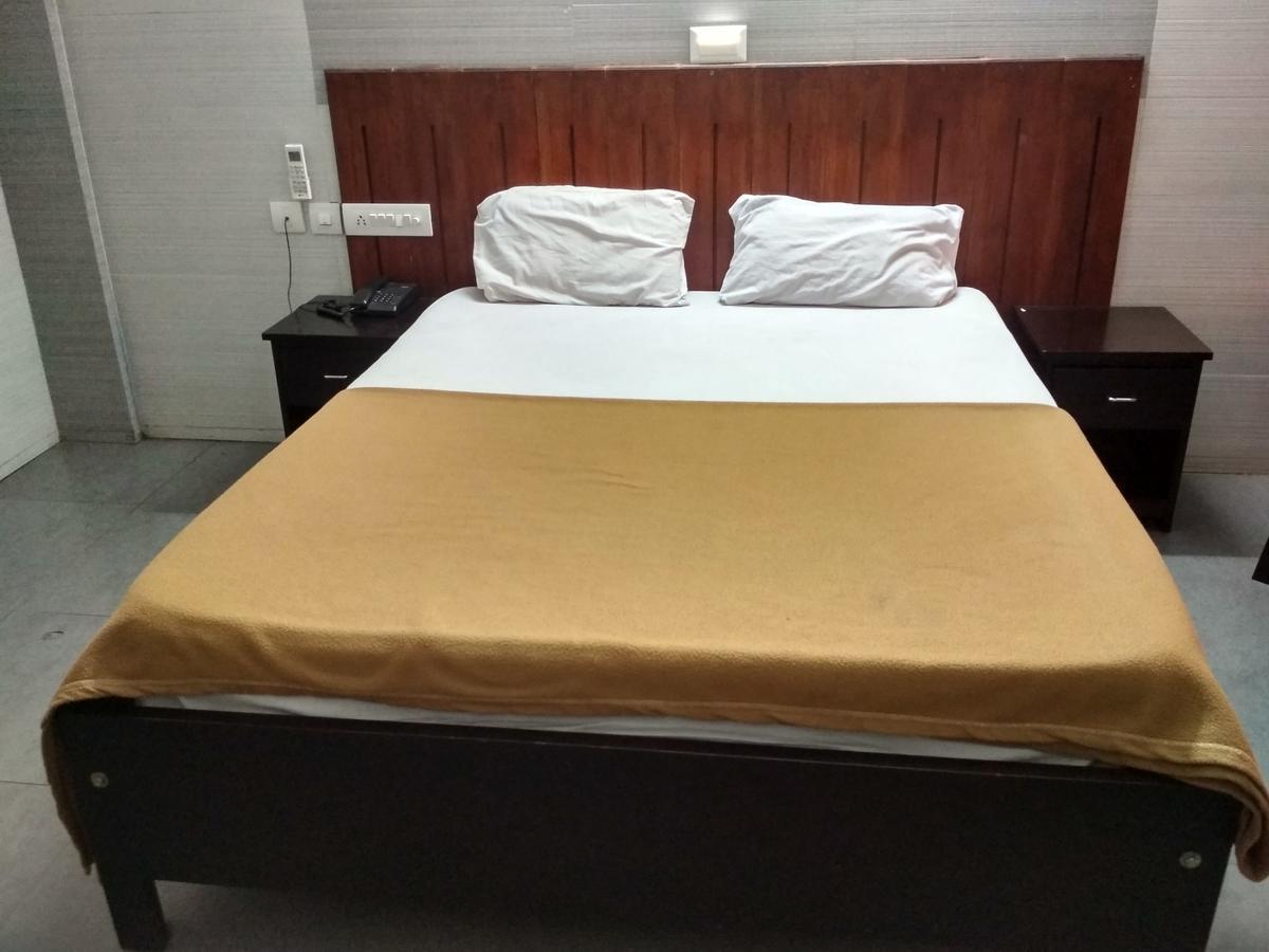 International Tourist Home Кожикод Екстериор снимка